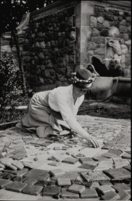 Mary Chase Perry Stratton installing Pewabic Pottery tiles, 1920 - 2014.002.088