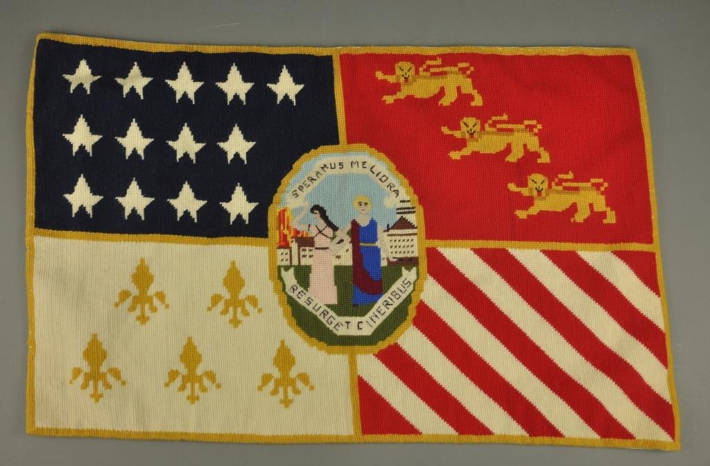 This needlepoint interpretation of the flag of the city of Detroit was made in 1976, by Helen Coutts, a retired English teacher from Redford High School and a member of the Detroit Historical Society Guild.