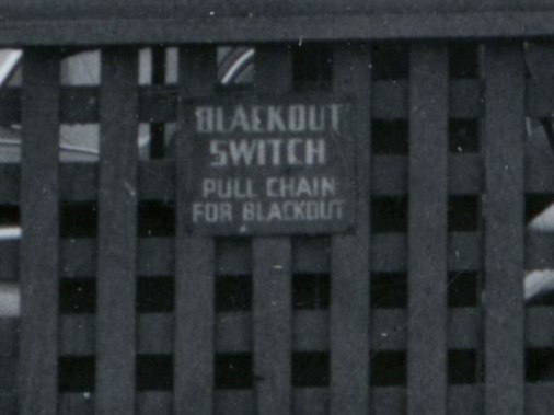 1943, detail of blackout switch on a war bonds advertisement as a precaution for enemy air raids.