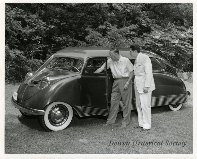 Philip K. Wrigley shows his Stout Scarab to Henry D. Brown, Director of the Detroit Historical Society (1964).