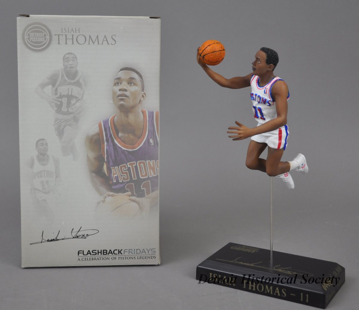 One limited edition plastic "Isiah Thomas" statue in original box. 