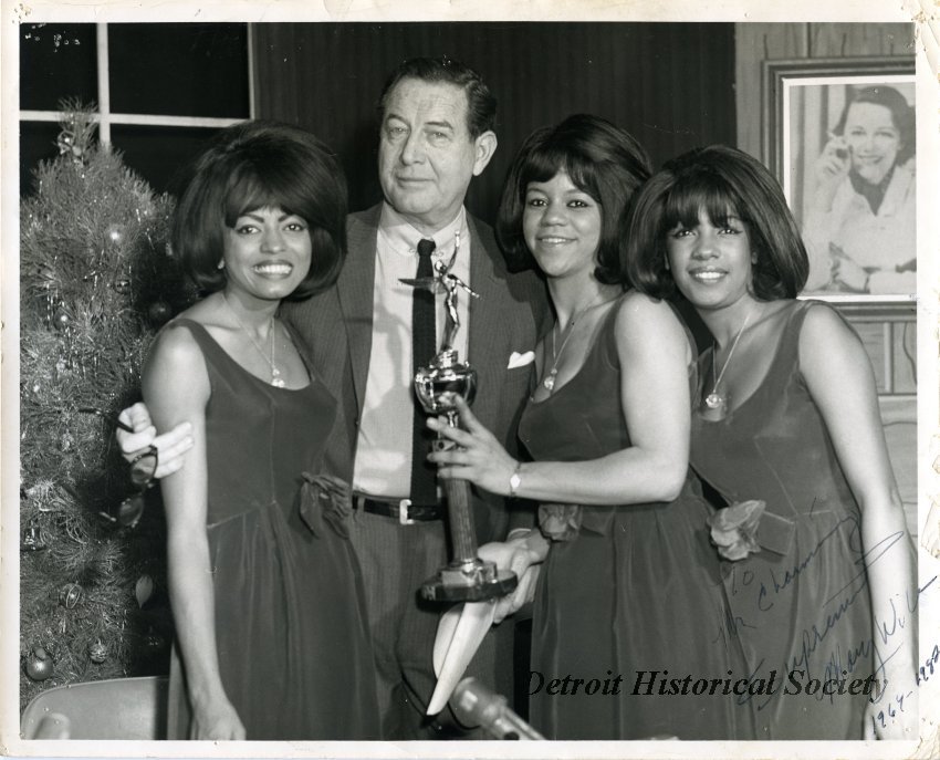 Photograph of Bill Kennedy and The Supremes (left to right: Diana Ross, Bill Kennedy, Florence Ballard, and Mary Wilson), 1964 